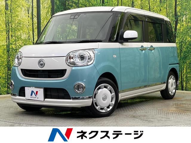 ムーヴキャンバス(ダイハツ) Ｇメイクアップリミテッド　ＳＡＩＩＩ　４ＷＤ　両側電動ドア　純正８型ナビ　全周囲カメラ　衝突被害軽減システム　禁煙車　シートヒーター　ドラレコ　スマートキー　ＬＥＤヘッド　オートハイビーム　車線逸脱警報　オートライト　オートエアコン 中古車画像