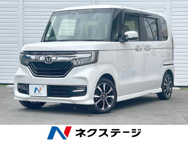 Ｎ－ＢＯＸカスタム Ｇ・Ｌホンダセンシング　ＳＤナビ　バックカメラ　ＬＥＤライト　アダプティブクルーズコントロール　電動スライドドア　スマートキー　オートエアコン　純正１４インチアルミホイール　禁煙車（1枚目）
