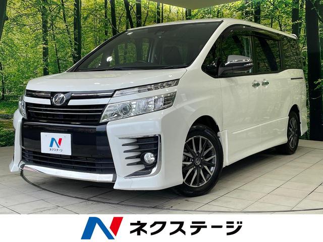 ヴォクシー ＺＳ　煌　両側電動ドア　９型ＢＩＧーＸ　バックカメラ　衝突被害軽減システム　禁煙車　スマートキー　ＬＥＤヘッド　ビルトインＥＴＣ　オートハイビーム　車線逸脱警報　オートライト　デュアルエアコン　７人乗り（1枚目）