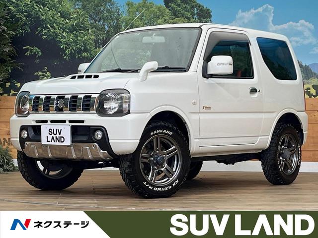 ジムニー クロスアドベンチャー　４ＷＤ　バックカメラ　禁煙車　シートヒーター　ドラレコ　ＨＩＤヘッド　ＥＴＣ　純正１６インチアルミ　Ｂｌｕｅｔｏｏｔｈ　ＣＤ　ＤＶＤ再生　フルセグ　ＬＥＤフォグ（1枚目）