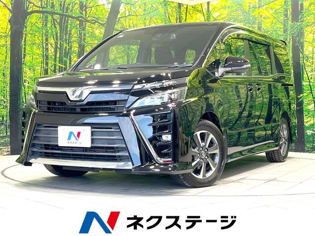 ヴォクシー ＺＳ　禁煙車　両側電動ドア　ＳＤナビ　バックカメラ　衝突被害軽減システム　ドラレコ　スマートキー　ＬＥＤヘッド　ビルトインＥＴＣ　クルコン　オートハイビーム　デュアルエアコン　クリアランスソナー（1枚目）