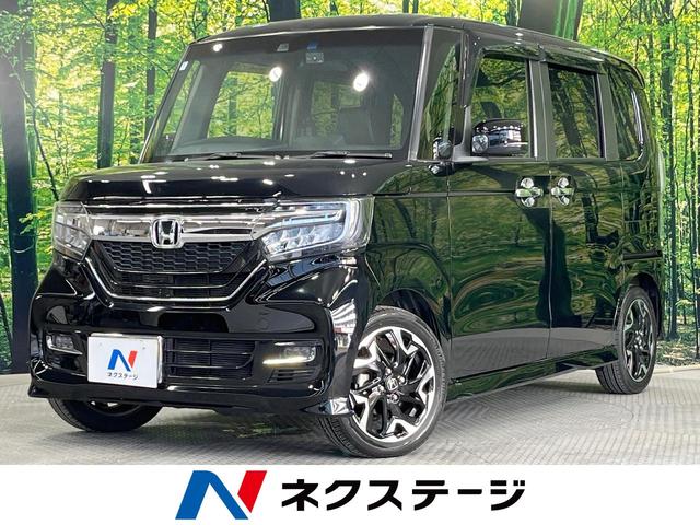 Ｎ－ＢＯＸカスタム Ｇ・Ｌターボホンダセンシング　両側電動ドア　純正８型ＳＤナビ　バックカメラ　衝突被害軽減システム　レーダークルーズ　禁煙車　ハーフレザーシート　ドラレコ　コーナーセンサー　スマートキー　ＬＥＤヘッド　ビルトインＥＴＣ　車線逸脱警報（1枚目）