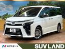ヴォクシー ハイブリッドＺＳ　煌ＩＩ　後席モニター　９型ナビ　７人乗り　禁煙車　両側パワスラ　シートヒーター　セーフティセンス　クルコン　クリアランスソナー　リアオートエアコン　純正１６アルミ　ＬＥＤヘッド　バックカメラ　ＥＴＣ　フルセグ（1枚目）
