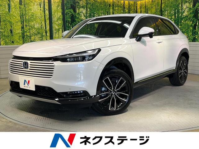 ヴェゼル ｅ：ＨＥＶ　Ｚ　登録済未使用車　純正９型ナビ　バックカメラ　ホンダセンシング　レーダークルーズ　ハーフレザーシート　シートヒーター　コーナーセンサー　スマートキー　ＬＥＤヘッド　ＥＴＣ　オートマチックハイビーム（1枚目）