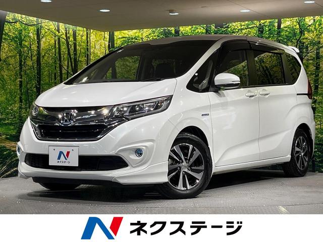 フリードハイブリッド　愛知県 フルエアロ　両側電動ドア　純正ＳＤナビ　後席モニター　バックカメラ