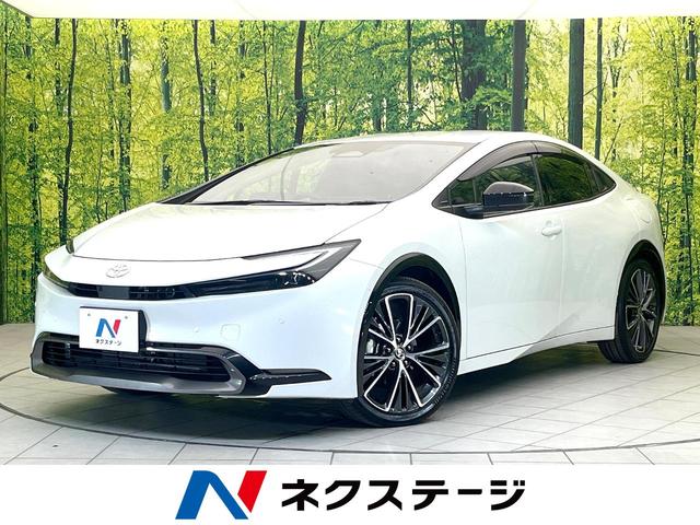 プリウス Ｚ　禁煙車　純正１２．３型ディスプレイオーディオ　全方位モニター　セーフティセンス　レーダークルーズ　ＢＳＭ　パワーバックドア　シートエアコン　ＥＴＣ　ドラレコ　ステアリングヒーター　パワーシート（1枚目）