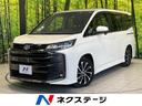 ノア ハイブリッドＳ－Ｚ　１０．５型ナビ　１４インチ後席モニター　両側電動ドア　バックカメラ　シートヒーター　トヨタセーフティセンス　レーダークルーズ　禁煙車　ハーフレザーシート　ドラレコ　コーナーセンサー　ＥＴＣ２．０（1枚目）