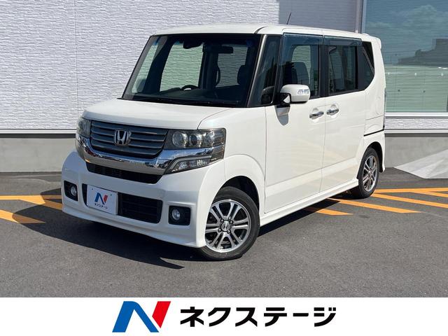 Ｎ－ＢＯＸカスタム Ｇ　ＳＳパッケージ　ＳＤナビ　両側電動ドア　バックカメラ　禁煙車　ドラレコ　ＨＩＤヘッド　ＥＴＣ　オートエアコン　純正１４インチアルミ　Ｂｌｕｅｔｏｏｔｈ　ＣＤ　ＤＶＤ再生　フルセグ（1枚目）