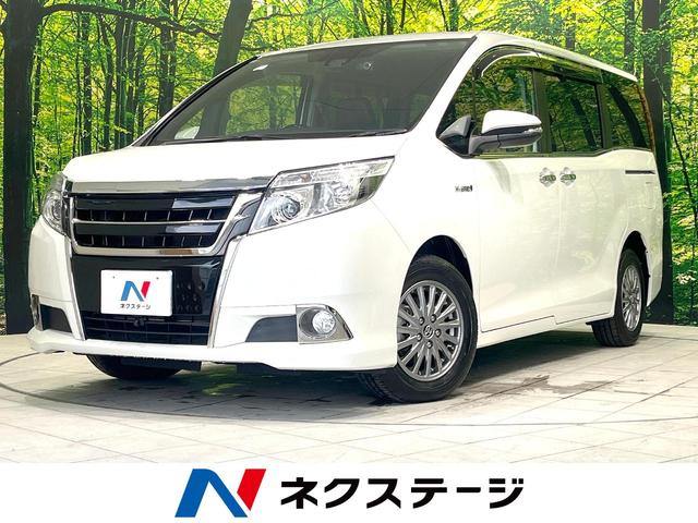 エスクァイア ハイブリッドＧｉ　禁煙車　純正１０インチナビ　両側電動ドア　ブラックレザーシート　衝突被害軽減システム　ドラレコ　スマートキー　バックカメラ　ＬＥＤヘッド　ビルトインＥＴＣ　クルコン　オートライト　デュアルエアコン（1枚目）