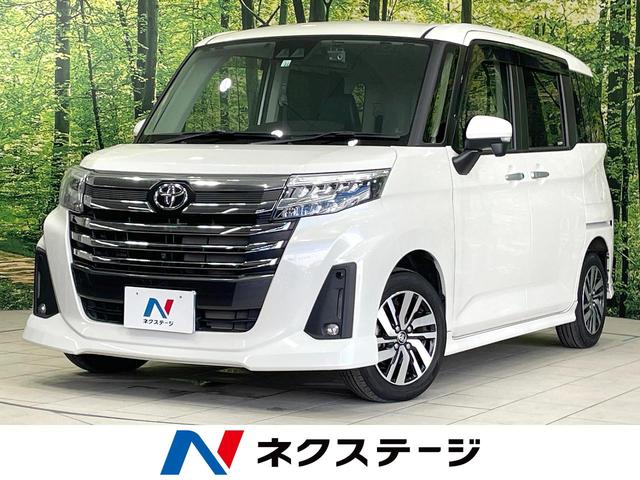 ルーミー カスタムＧ　純正９型ナビ　全周囲カメラ　両側電動ドア　衝突軽減　ドラレコ　ＥＴＣ　禁煙車　レーダークルーズ　コーナーセンサー　シートヒーター　ＬＥＤヘッド　オートライト　オートエアコン　スマートキー　ＬＥＤフォグ（1枚目）