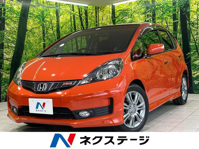 フィット ＲＳ　純正ナビ　バックカメラ　ＣＤ／ＤＶＤ再生　ドラレコ　ＥＴＣ　キーレスエントリー　オートエアコン　オートライト　ＨＩＤヘッドライト　純正１６インチＡＷ　禁煙車　電動格納ミラー　ドアバイザー（1枚目）