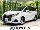 オデッセイハイブリッド ハイブリッドアブソルート・ホンダセンシング　両側電動ドア　純正ＳＤナビ　バックカメラ　衝突被害軽減システム　レーダークルーズ　禁煙車　ハーフレザーシート　パワーシート　ドラレコ　コーナーセンサー　スマートキー　ＬＥＤヘッド　ビルトインＥＴＣ（1枚目）