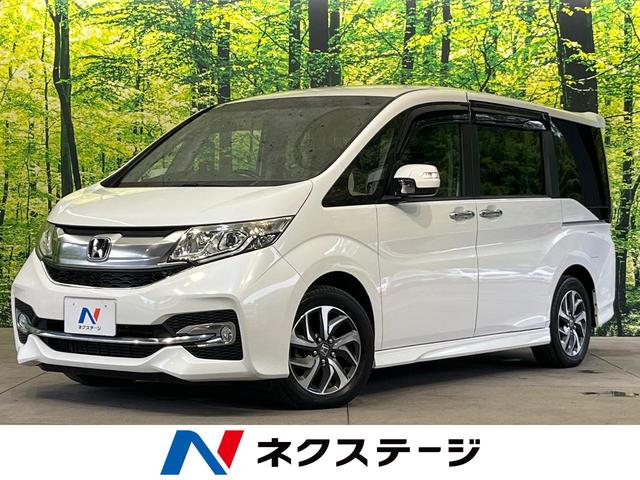 ステップワゴンスパーダ スパーダ　両側電動ドア　禁煙車　スマートキー　ＬＥＤヘッド　ＥＴＣ　クルコン　オートライト　オートエアコン　純正１６インチアルミ　Ｂｌｕｅｔｏｏｔｈ　ＣＤ　ＤＶＤ再生　フルセグ（1枚目）