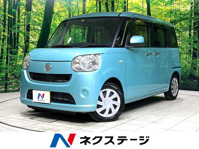 ムーヴキャンバス Ｘ　ＳＤナビ　バックカメラ　禁煙車　ＥＴＣ　オートライト　オートエアコン　スマートキー　横滑り防止装置　アイドリングストップ　電動格納ミラー　バニティミラー　ドアバイザー　プライバシーガラス（1枚目）