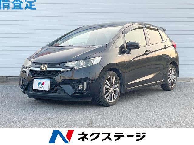 沖縄県の中古車ならフィットハイブリッド Ｓパッケージ　１年保証　ＳＤナビ　バックカメラ　スマートキー　ＬＥＤヘッド　ビルトインＥＴＣ　クルコン　オートライト　オートエアコン　純正１６インチアルミ　Ｂｌｕｅｔｏｏｔｈ　ＣＤ　ＤＶＤ再生　フルセグ