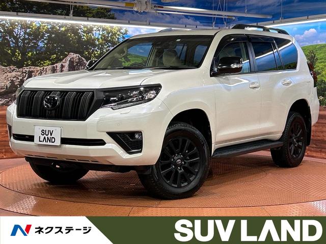 ランドクルーザープラド ＴＸ　Ｌパッケージ　マットブラックエディション　ベージュ革シート　７人乗り　ムーンルーフ　純正ナビ　全周囲カメラ　前席シートヒーター＆シートベンチレーション　ブラインドスポットモニター　セーフティセンス　レーダークルーズ　ドラレコ　ＥＴＣ（1枚目）