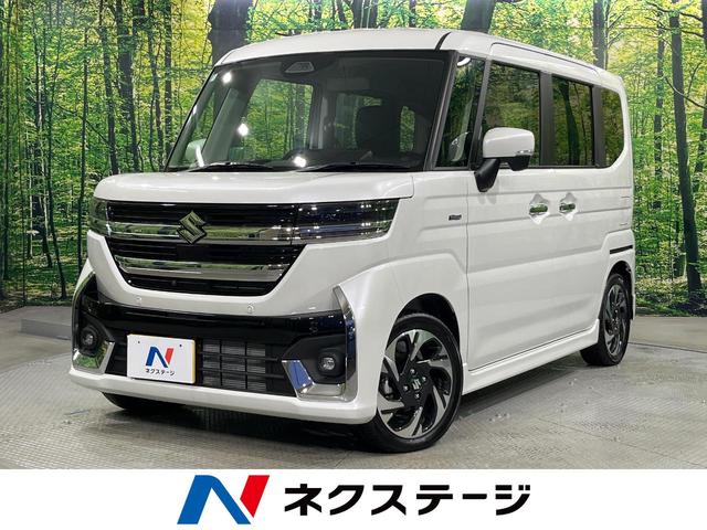 スペーシアカスタム ハイブリッドＸＳターボ　届出済未使用車　地図機能付きディスプレイオーディオ　ターボ　全周囲カメラ　両側電動ドア　衝突被害軽減システム　レーダークルーズ　コーナーセンサー　シートヒーター　オートハイビーム　車線逸脱警報（1枚目）