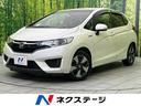 フィットハイブリッド Ｌパッケージ　純正ナビ　バックカメラ　禁煙車　クルーズコントロール　ハーフレザーシート　ＥＴＣ　ドラレコ　Ｂｌｕｅｔｏｏｔｈ再生　オートエアコン　オートライト　スマートキー　電動格納ミラー　アイドリングストップ（1枚目）