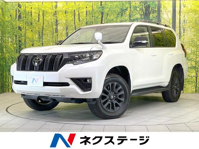 ランドクルーザープラド ＴＸ　Ｌパッケージ　マットブラックエディション　禁煙車　４ＷＤ　７人乗り　バックカメラ　レーダークルーズ　レザーシート　前席シートエアコン　ドラレコ　コーナーセンサー　スマートキー　ＬＥＤヘッド　ビルトインＥＴＣ　オートハイビーム　車線逸脱警報（1枚目）