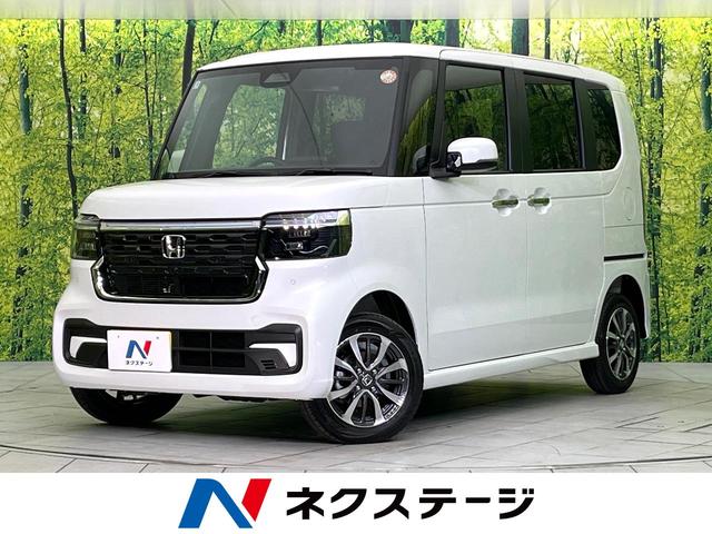 Ｎ－ＢＯＸカスタム ベースグレード　４ＷＤ　届出済未使用車　両側電動スライド　ホンダセンシング　レーダークルーズ　コーナーセンサー　純正１４インチアルミホイール　ＬＥＤヘッド　車線逸脱警報　オートライト　アダプティブハイビーム（1枚目）