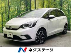 フィット e:HEVホーム 純正9型ナビ バックカメラ 衝突被害軽減システム 禁煙車 レーダークルーズ ハーフレザーシート ドラレコ コーナーセンサー スマートキー LEDヘッド ビルトインETC オートライト 中古車画像
