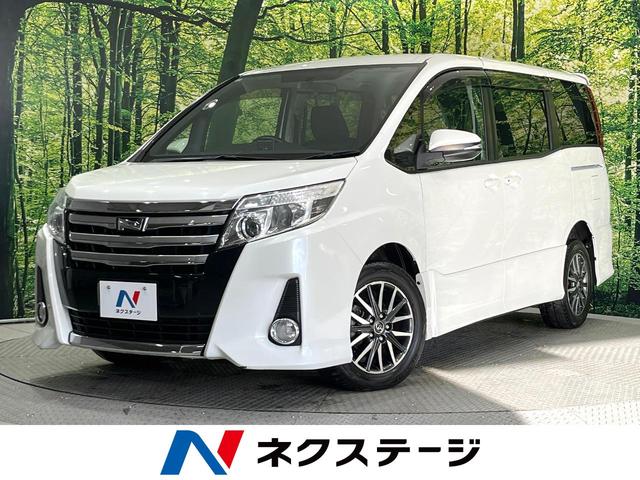 ノア Ｓｉ　４ＷＤ　両側電動ドア　純正ＳＤナビ　後席モニター　バックカメラ　寒冷地仕様　禁煙車　スマートキー　ＬＥＤヘッド　ビルトインＥＴＣ　オートライト　デュアルエアコン　純正１６インチアルミ　リアエアコン（1枚目）