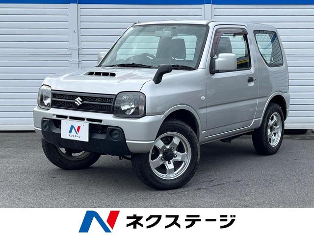 ジムニー ＸＧ　４ＷＤ　ターボ　メモリーナビ　バックカメラ　ＥＴＣ　純正１６インチアルミ　Ｂｌｕｅｔｏｏｔｈ　ＣＤ　ＤＶＤ再生　フルセグ　キーレスエントリー　ドアバイザー（1枚目）
