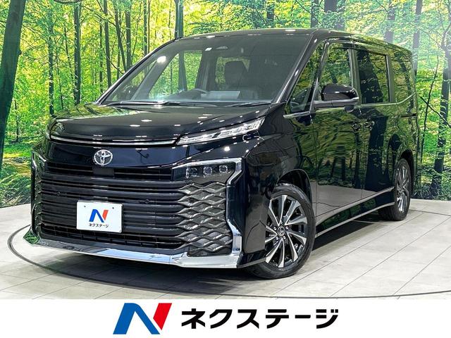 ヴォクシー Ｓ－Ｚ　快適利便パッケージ　純正１０．５型ナビ　フリップダウンモニター　バックカメラ　両側パワスラ　パワーバックドア　シ－トヒ－タ－　ハ－フレザ－シ－ト　ブラインドスポットモニタ－　ＥＴＣ　禁煙車（1枚目）