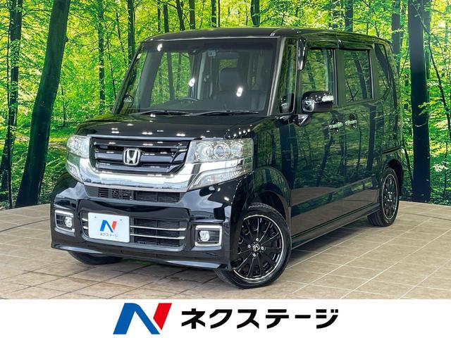 沖縄県の中古車ならＮ－ＢＯＸカスタム Ｇ　ターボＳＳブラックスタイルパッケージ　１年保証付　両側電動ドア　純正ナビ　バックカメラ　衝突被害軽減システム　禁煙車　ハーフレザーシート　ドラレコ　ＨＩＤヘッド　ＥＴＣ　クルコン　オートライト　オートエアコン　純正１５インチアルミ