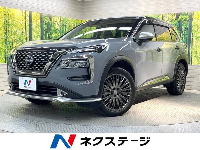 エクストレイル オーテック　ｅ－４ＯＲＣＥ　アドバンスドパッケージ　４ＷＤ　１２．３インチ日産コネクトナビ　全周囲カメラ　衝突軽減装置　レーダークルーズ　禁煙車　電動リアゲート　レザーシート　シートヒーター　パワーシート　ドラレコ　ＬＥＤヘッド　ＥＴＣ２．０（1枚目）