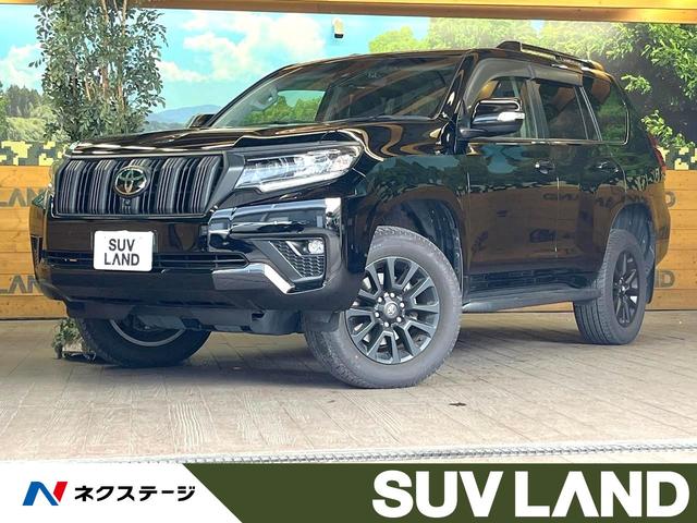 ランドクルーザープラド ＴＸ　Ｌパッケージ　マットブラックエディション　４ＷＤ　７人乗り　サンルーフ　９インチディスプレイオーディオ　全周囲カメラ　レーダークルーズ　デジタルインナーミラー　ＥＴＣ　シートベンチレーション　ＬＥＤヘッド　黒革シート　禁煙車　パワーシート（1枚目）