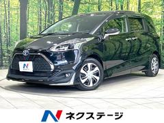 シエンタ ハイブリッド ファンベースG クエロ 後期型 禁煙車 モデリスタエアロ 9型ナビ バックカメラ 両側電動ドア 衝突被害軽減システム 100V電源 ハーフレザーシート ドラレコ コーナーセンサー スマートキー LEDヘッド ETC クルコン 中古車画像