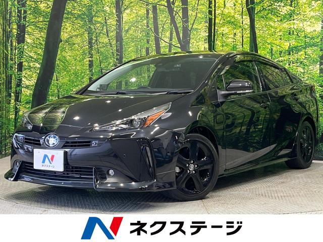 プリウス Ａツーリングセレクション・ブラックエディション　後期　純正８型ディスプレイオーティオ　全周囲カメラ　寒冷地仕様　セーフティセンス　レーダークルーズ　ブラインドスポットモニター　クリアランスソナー　黒合皮シート　パワーシート　シートヒーター　禁煙車（1枚目）
