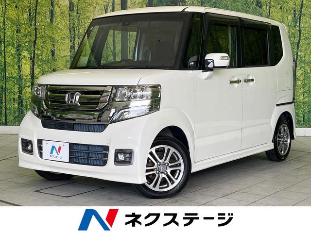 Ｎ－ＢＯＸカスタム Ｇ　ＳＳパッケージ　禁煙車　ＳＤナビ　バックカメラ　ＥＴＣ　両側電動スライドドア　シートヒーター　スマートキー　純正１４インチアルミ　衝突被害軽減ブレーキ　オートライト　ＨＩＤヘッド　Ｂｌｕｔｏｏｔｈ接続　オートエアコン（1枚目）