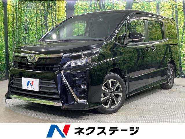 ヴォクシー ＺＳ　禁煙車　ＳＤナビ　バックカメラ　両側電動ドア　クルーズコントロール　衝突被害軽減システム　スマートキー　ＬＥＤヘッドライト　ビルトインＥＴＣ　オートハイビーム　車線逸脱警報　デュアルエアコン（1枚目）
