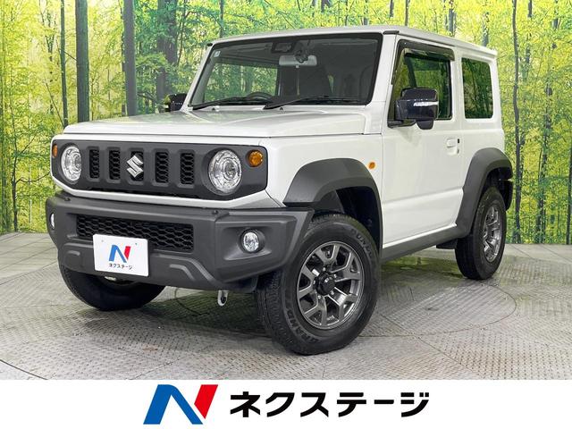 ジムニーシエラ ＪＣ　禁煙車　純正ナビ　バックカメラ　セーフティサポート　クルーズコントロール　ＥＴＣ　Ｂｌｕｅｔｏｏｔｈ　フルセグ　ドラレコ　シートヒーター　ＬＥＤヘッドライト　革巻きステアリング　純正１５インチＡＷ（1枚目）