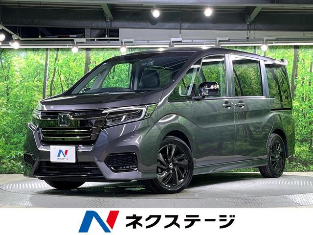 ステップワゴンスパーダ スパーダ・クールスピリット　ホンダセンシング　純正９インチナビ　後席モニター　バックカメラ　両側電動ドア　衝突被害軽減システム　レーダークルーズ　禁煙車　ハーフレザーシート　ドラレコ　コーナーセンサー　スマートキー　ＬＥＤヘッド　ビルトインＥＴＣ（1枚目）