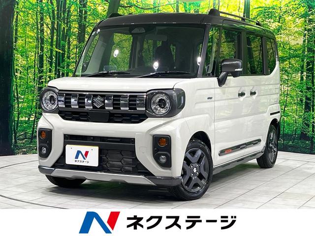 スペーシアギア ハイブリッドＸＺ　ターボ　禁煙車　９型純正ナビ　両側電動ドア　全周囲カメラ　衝突軽減システム　レーダークルーズ　コーナーセンサー　スマートキー　ＬＥＤヘッド　オートハイビーム　車線逸脱警報　オートライト　オートエアコン（1枚目）