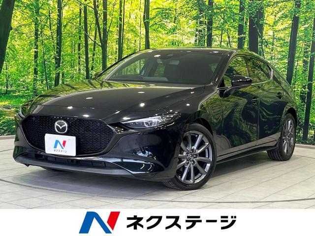 ＭＡＺＤＡ３ファストバック ＸＤプロアクティブ　ツーリングセレクション　衝突軽減装置　８型マツダコネクトナビ　全周囲カメラ　レーダークルーズ　ＥＴＣ　Ｂｌｕｅｔｏｏｔｈ　シートヒーター　ＬＥＤヘッド　レーンキープ　ブラインドスポットモニター　ステアリングヒーター　禁煙車（1枚目）