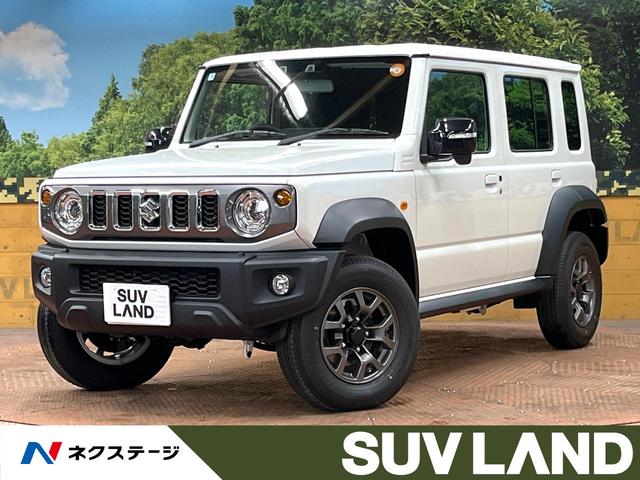 ジムニーノマド(スズキ) FC 登録済未使用車 セーフティサポート アダプティブクルーズ コーナーセンサー 車線逸脱警報 シートヒーター LEDヘッド 純正15アルミ オートハイビーム オートエアコン ダウンヒルアシスト 中古車画像