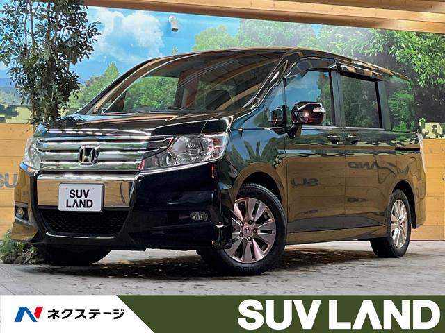 ステップワゴンスパーダ(ホンダ) Z 純正ナビ バックカメラ フリップダウンモニター 両側電動スライドドア ETC 純正革巻きステアリング 純正16インチアルミ スマートキー オートエアコン HIDヘッド 中古車画像
