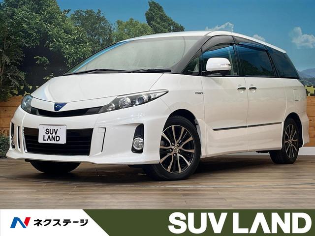 エスティマハイブリッド(トヨタ) アエラス 4WD 禁煙車 BIGX8型ナビ 10.2型後席モニター 両側電動スライドドア クルーズコントロール バックカメラ ETC 1500W電源 パワーシート 革巻きステアリング 純正17インチアルミ 中古車画像