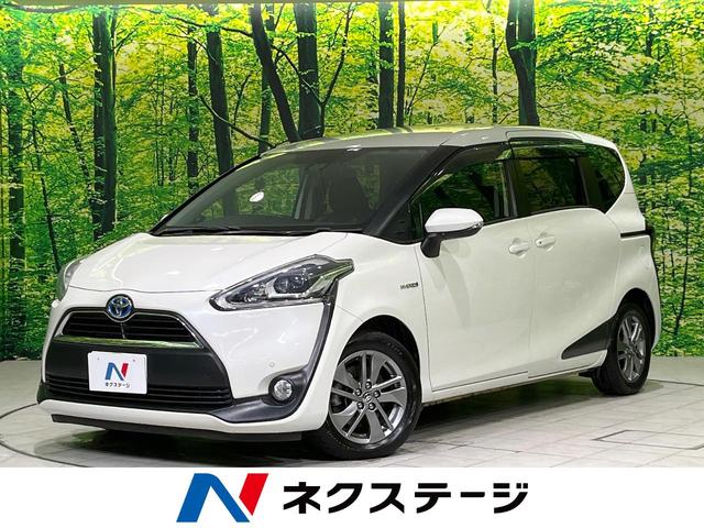シエンタ(トヨタ) ハイブリッドG クエロ 両側電動スライドドア 純正SDナビ バックカメラ 衝突被害軽減システム 禁煙車 ハーフレザーシート ドラレコ コーナーセンサー スマートキー LEDヘッド ビルトインETC オートハイビーム 中古車画像