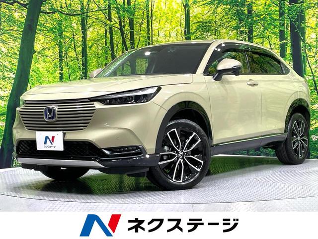 ヴェゼル(ホンダ) e:HEV Z 禁煙車 ホンダセンシング 9インチナビ アダプティブクルーズ バックカメラ ETC Bluetooth接続 フルセグ ドラレコ シートヒーター パワーバックドア 合皮シート LEDヘッド LEDフォグ 中古車画像
