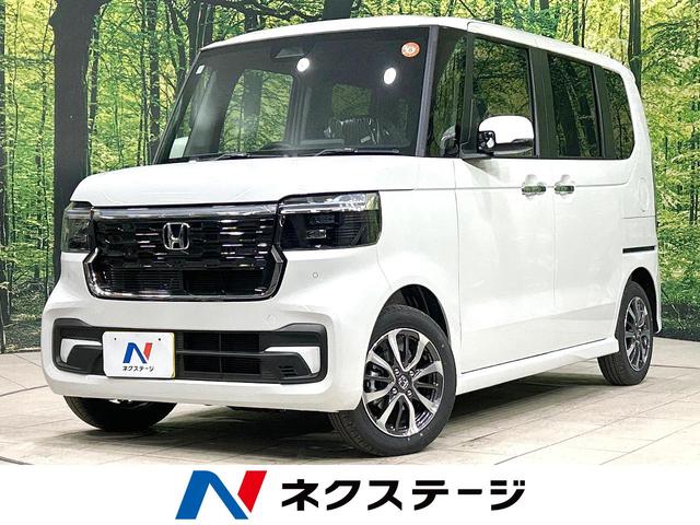 N−BOXカスタム(ホンダ) ベースグレード 届出済未使用車 両側電動スライドドア 衝突軽減装置 アダプティブクルーズ シートヒーター スマートキー 純正14インチAW オートライト オートエアコン オートマチックハイビーム 盗難防止装置 中古車画像