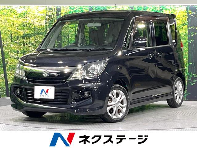 ソリオバンディット(スズキ) アイドリングストップ 禁煙車 メモリーナビ Bluetooth再生 地デジ 両側電動スライド オートエアコン スマートキー プッシュスタート 革巻きステアリング ウィンカーミラー シートリフター 電動格納ミラー 中古車画像