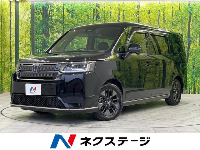 ステップワゴン(ホンダ) e:HEVスパーダ ホンダセンシング 10.1インチフリップダウンモニター 両側パワースライドドア 純正9インチナビ Bluetooth再生 ドライブレコーダー バックカメラ フルセグTV ETC 禁煙車 中古車画像