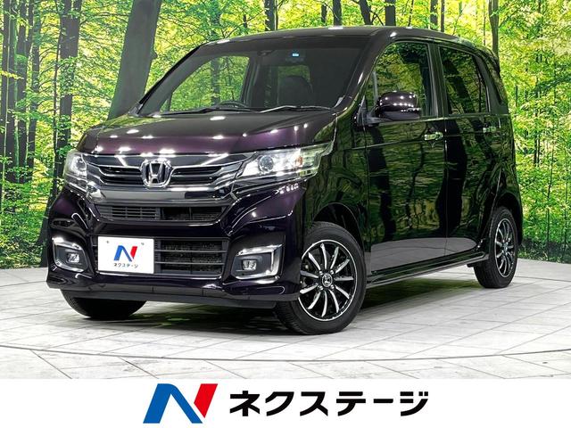N−WGNカスタム(ホンダ) G・Lパッケージ 4WD SDナビ バックカメラ シートヒーター 禁煙車 ハーフレザーシート ドラレコ スマートキー HIDヘッド ビルトインETC クルコン オートライト オートエアコン 純正14インチアルミ 中古車画像