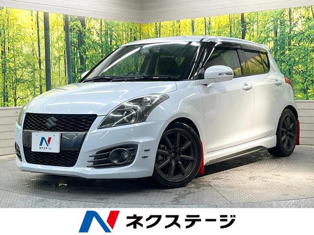 スイフトスポーツ(スズキ) ベースグレード MT車 SDナビ バックカメラ 禁煙車 ドラレコ スマートキー HIDヘッド ビルトインETC クルコン オートエアコン Bluetooth CD DVD再生 フルセグ 17インチアルミ 中古車画像