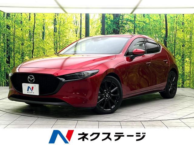 MAZDA3ファストバック(マツダ) Xバーガンディ セレクション 全周囲カメラ 衝突被害軽減システム レーダークルーズ 禁煙車 レザーシート パワーシート コーナーセンサー スマートキー LEDヘッド ビルトインETC オートハイビーム 車線逸脱警報 オートライト 中古車画像